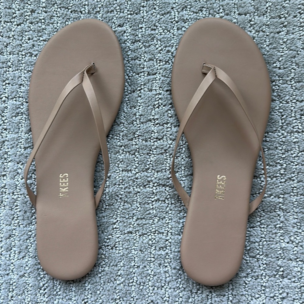 Brand NWT Tkees flip flops, never worn